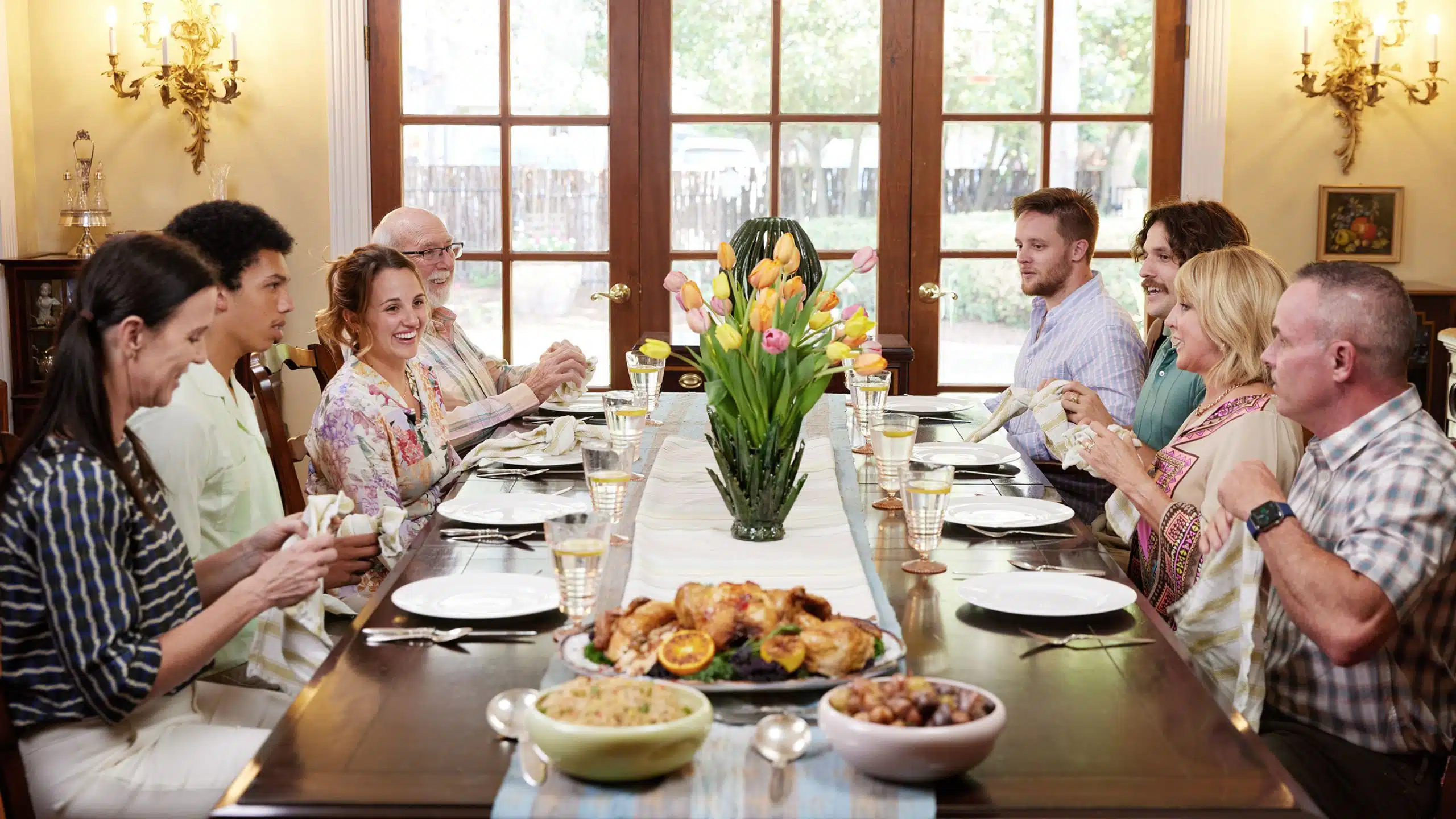 family sitting around dinner table