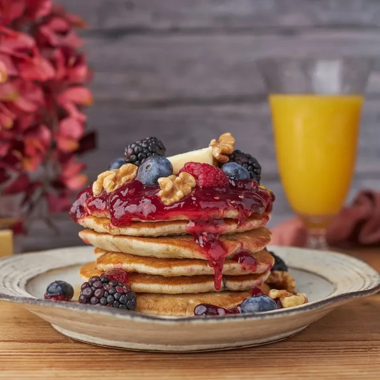 pancakes featuring triple berry jam